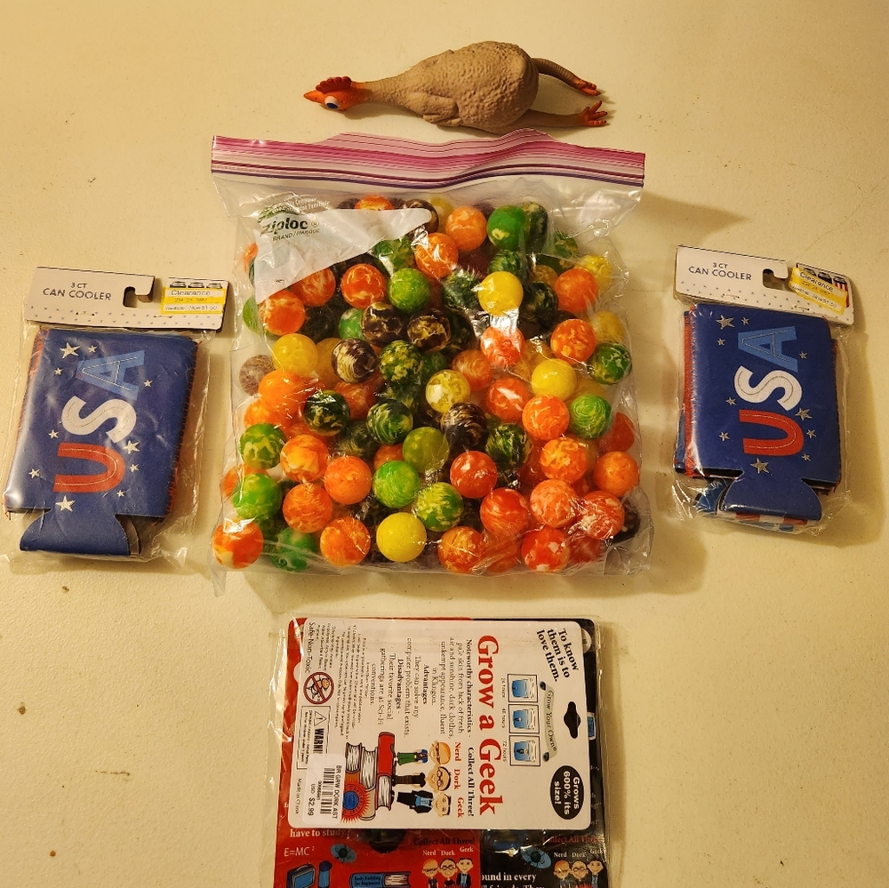 Over 100 rubber balls ,1 rubber chicken,3 grow a dorks,plus